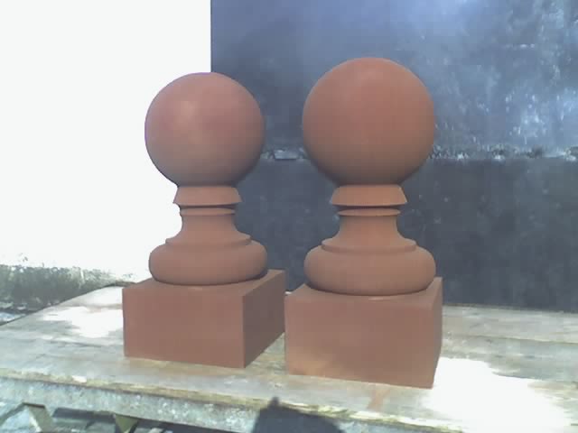 Two Red Sand Stone Finials